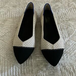 The Point Rothy's Black and Cream Flats with Pointed Toe
